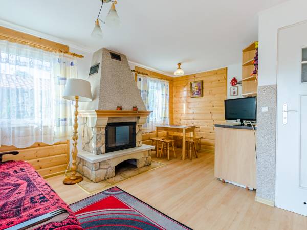 Domki całoroczne z kominkami i Apartamenty Grześ/Promyk Edenu Domki całoroczne z kominkami i Apartamenty Grześ/Promyk Edenu