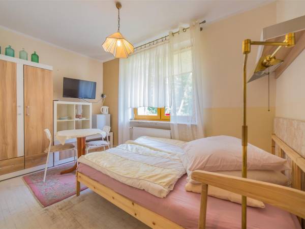 Pod Lasem - domki i pokoje gościnne Pod Lasem - domki i pokoje gościnne