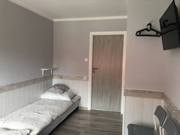 Kamienny Dworek Pokoje Gościnne i Pracownicze