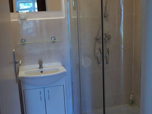 Łazienka w pokoju w pawilonie