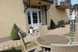 "Pod Lwem" Pokoje Gościnne i Domki Letniskowe