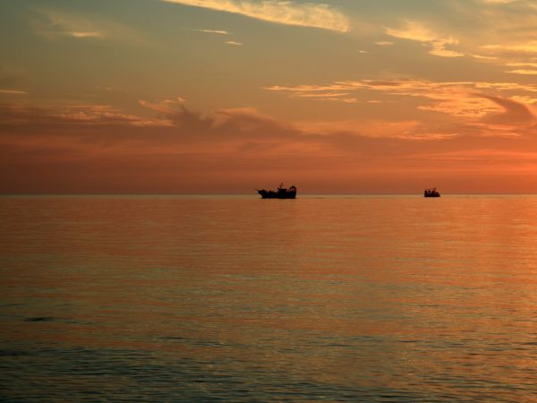 Rowy-zachód słońca nad Bałtykiem