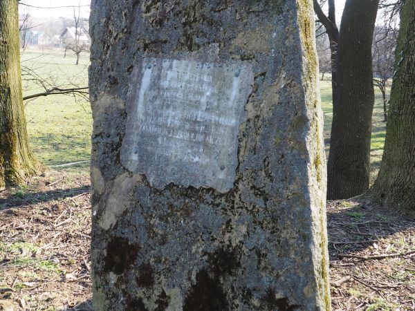 pomnik z tablicą, odsłonięty w rocznicę 1000-lecia Państwa Polskiego, na skraju parku dworskiego, na terenie przyszkolnym - fundatorami byli uczniowie i kadra p