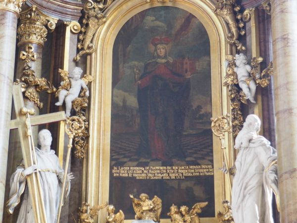 obraz przedstawia Jadwigę - Świętą Księżną, była żoną księcia Henryka Brodatego, dla męża była autorytetem i zarazem oparciem, to za jej namową Henryk fundował