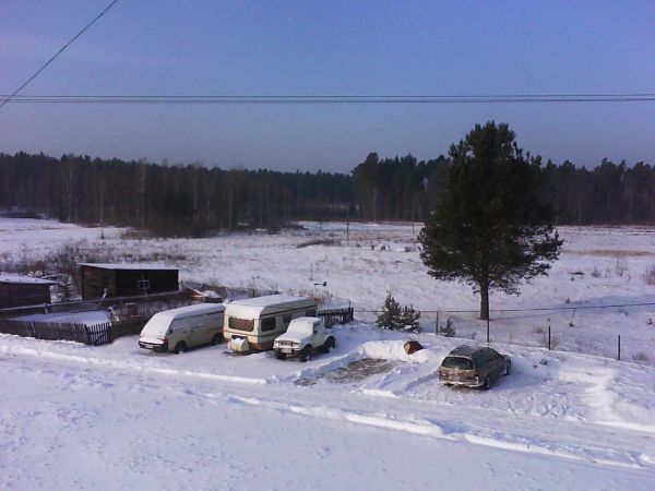 Nowa Wieś gm. Purda widok na las w kierunku Nowych Ramuk przez obszar byłego tartaku już nie istniejącego
