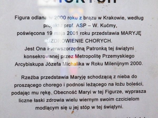 w kaplicy po lewej przy rzeźbie MB Uzdrowienia Chorych.