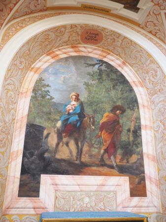 scena przedstawia św. Rodzinę podczas ucieczki do Egiptu.