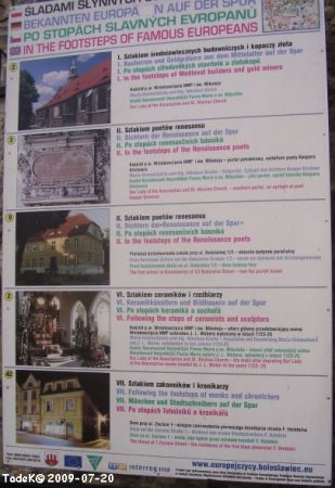 Opis dotyczący m.in.kościoła p.w. Wniebowzięcia NMP i św. Mikołaja.
Tablice informacyjne są rozmieszczone przy poszczególnych obiektach. Ta jest na ul. Kościel