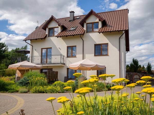 Pokoje i domki przy Leśniczówce