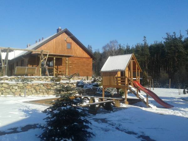 Pokoje i domki przy Leśniczówce