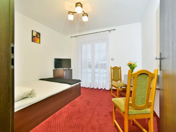 sypialnia rodziców w studio