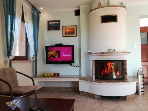 kominek ogrzewa cały dom