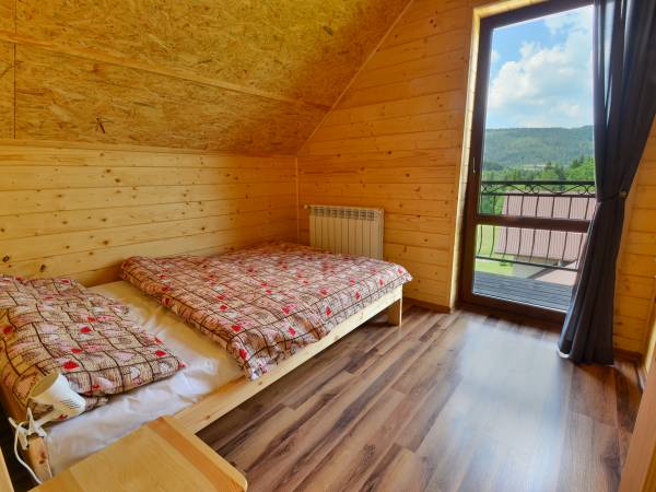 Sypialnia z balkonem DOMEK