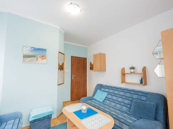 Widok na pokój 3 osob. na z wyjściem na olbrzymi taras, gdzie słońce świeci do wieczora.