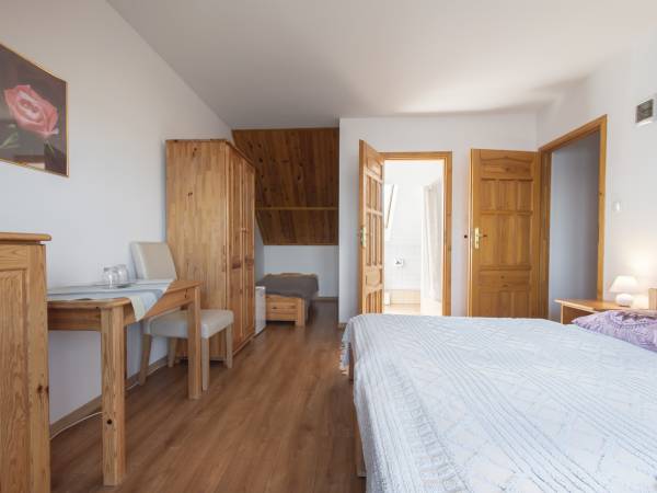 Apartamenty i Pokoje nad brzegiem jeziora Tałty