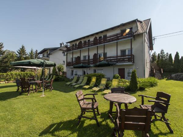 Apartamenty i Pokoje nad brzegiem jeziora Tałty