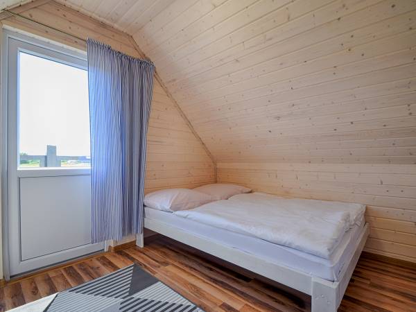 Sypialnia z wyjściem na balkon