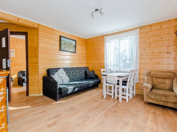 Domki całoroczne z kominkami i sauną i Apartamenty Grześ/Promyk Edenu
