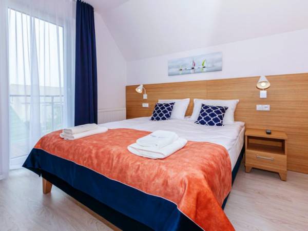 sypialnia w apartamencie 4-os.