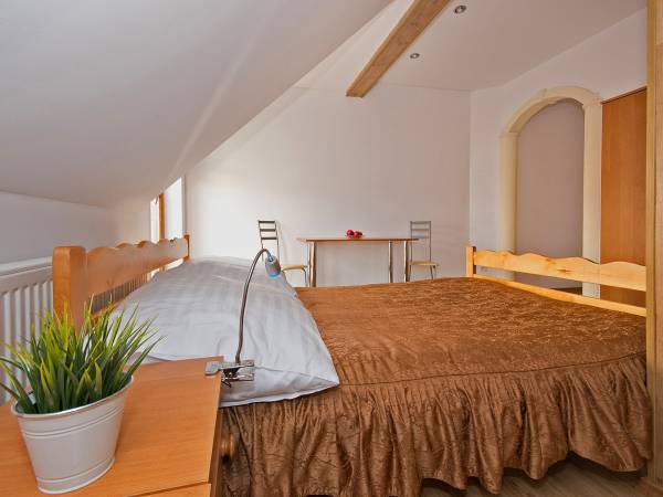 Sypialnia w domu gościnnym Villa Eliza