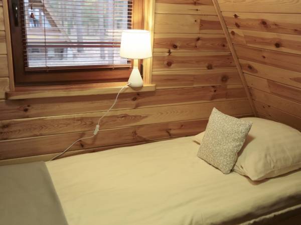 Sypialnia dla jednej osoby w domku "Leśna Chata"