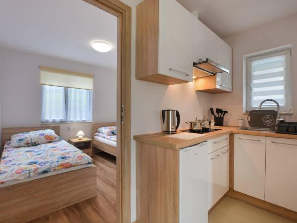 Ujęcie na kuchnie i sypialnie.