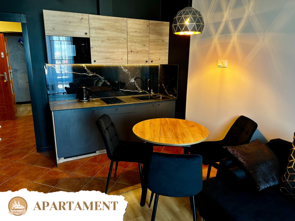 Apartament - aneks kuchenny i jadalnia