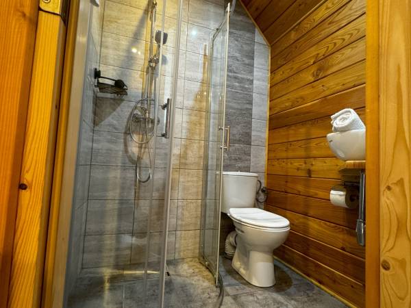 Łazienki w pokojach