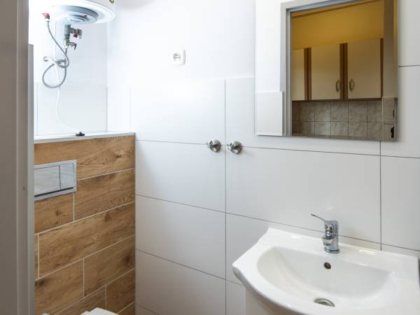 Łazienki w pokojach