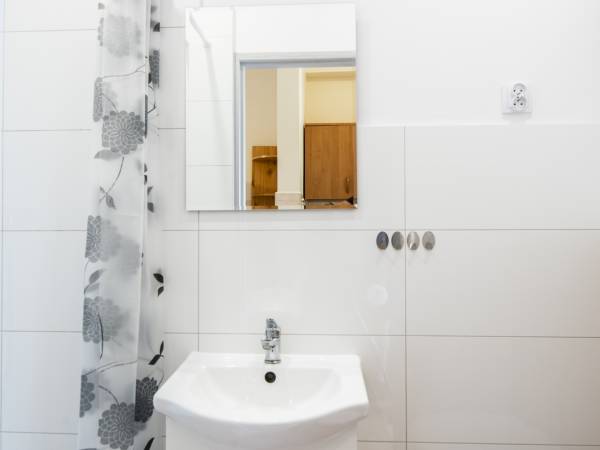 Łazienki w pokojach