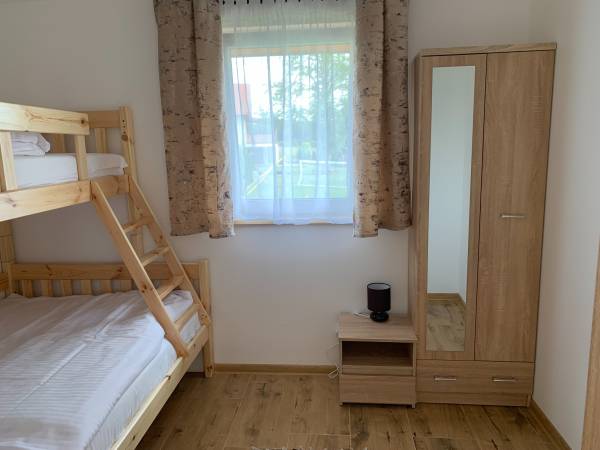 Sypialnia - domek z kominkiem