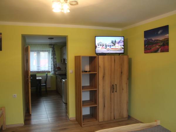 Apartament 4 osobowy - sypialnia z kuchnią.