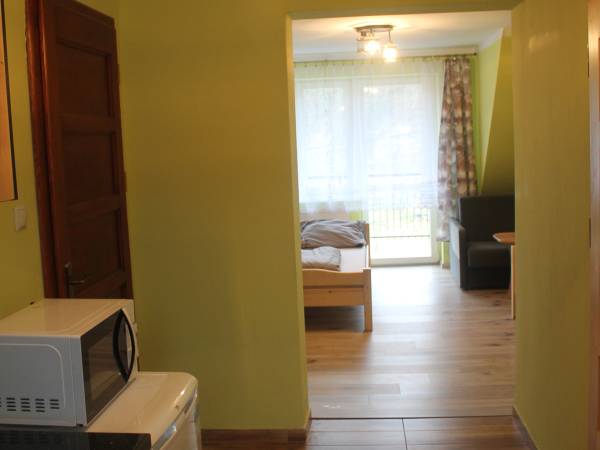 Apartament 4 osobowy - kuchnia i sypialnia