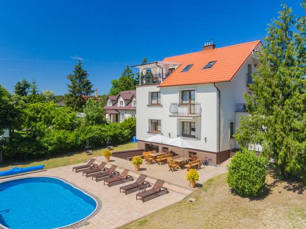 Bryza Jantar Domki z kominkami & Apartamenty z sauną