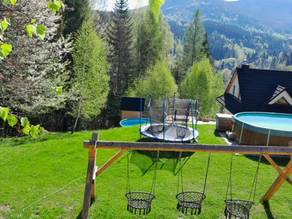 Nad Koroną z Jacuzzi domki i pokoje