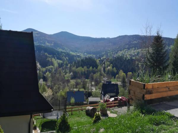 Nad Koroną z Jacuzzi domki i pokoje
