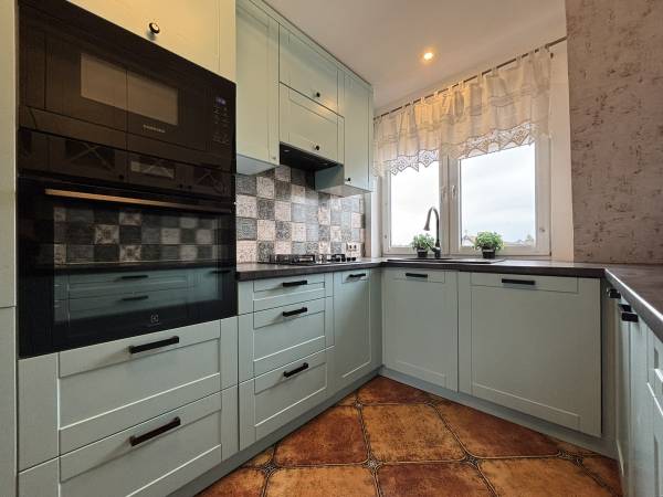 apartament dwupoziomowy z kominkiem