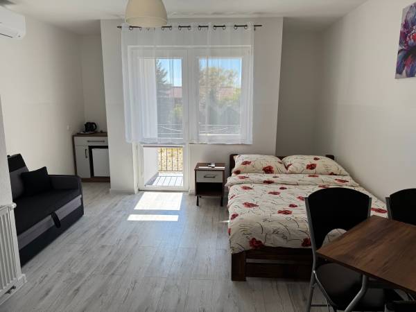 pokój 4 osobowy z balkonem