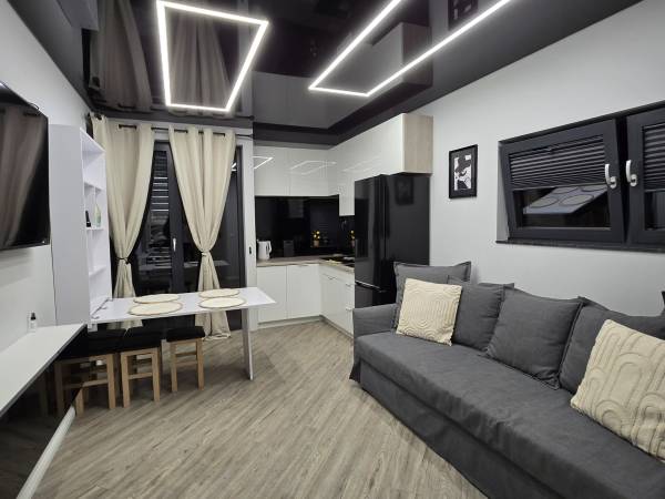 salon beż z aneksem kuchennym