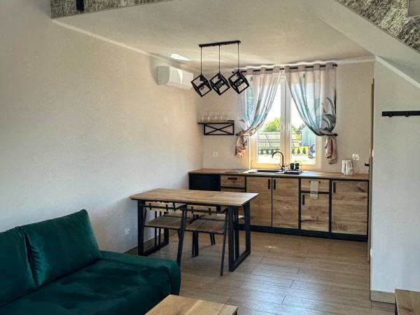 Domki Aurora klimatyzowane, z podgrzewanym basenem i zjeżdżalnią wodną