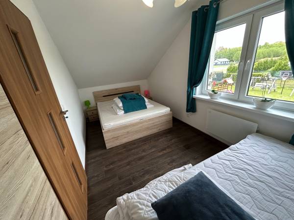 Delfinek - Domki - Apartamenty 