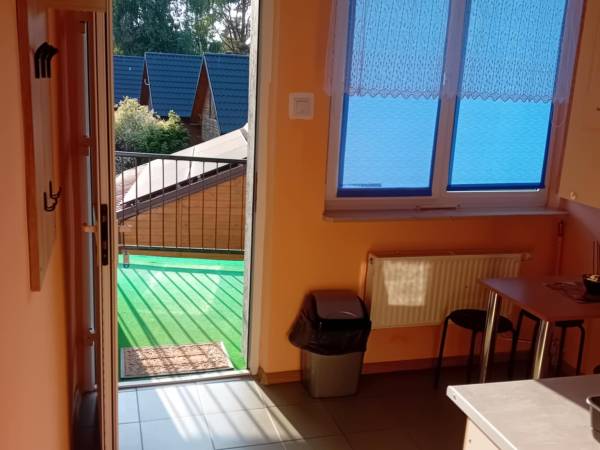 Domki i Pokoje Pod Palmami