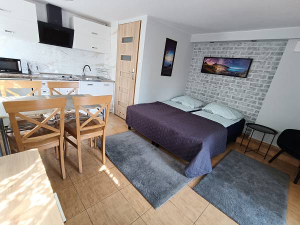 Pokój z aneksem kuchennym