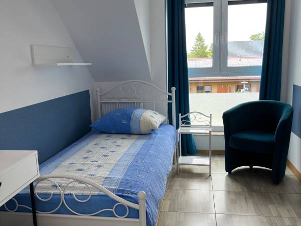 Sypialnia w apartamencie dwupoziomowym
