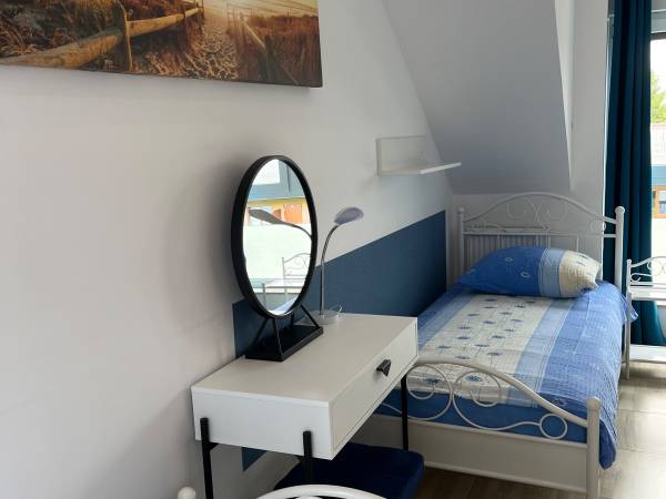 Sypialnia w apartamencie dwupoziomowym