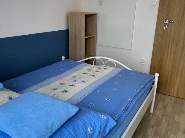 Sypialnia w apartamencie dwupoziomowym