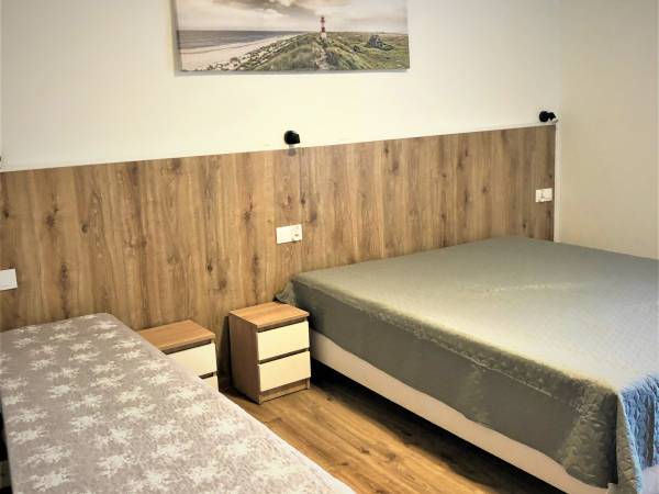 Sypialnia w Apartamencie Mała Frajda