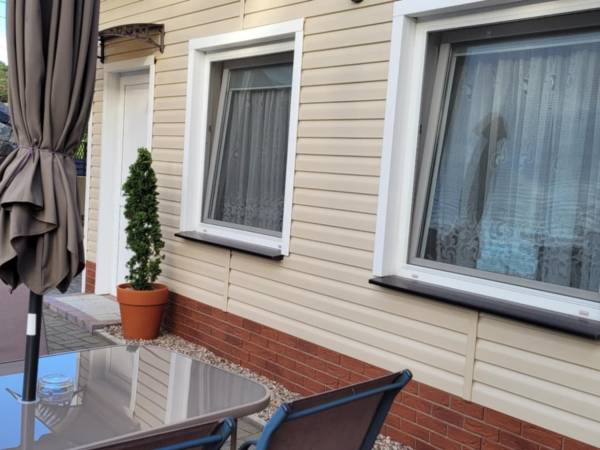 "Pod Lwem" Pokoje Gościnne i Domki Letniskowe