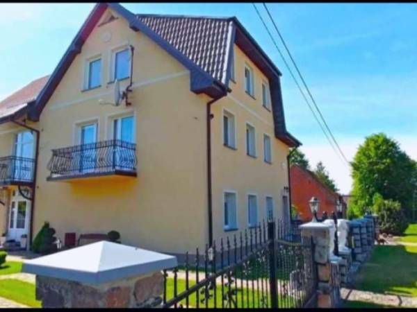 "Pod Lwem" Pokoje Gościnne i Domki Letniskowe