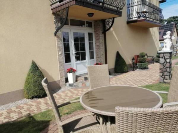 "Pod Lwem" Pokoje Gościnne i Domki Letniskowe